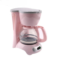 Cafetière Rose Goutte à Goutte Électrique, sur un fond blanc.