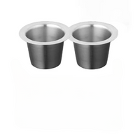 Lot de 2 Capsule Nespresso Rechargeable Argentée, sur un fond blanc.